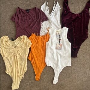 Lot of 6 small body suits
